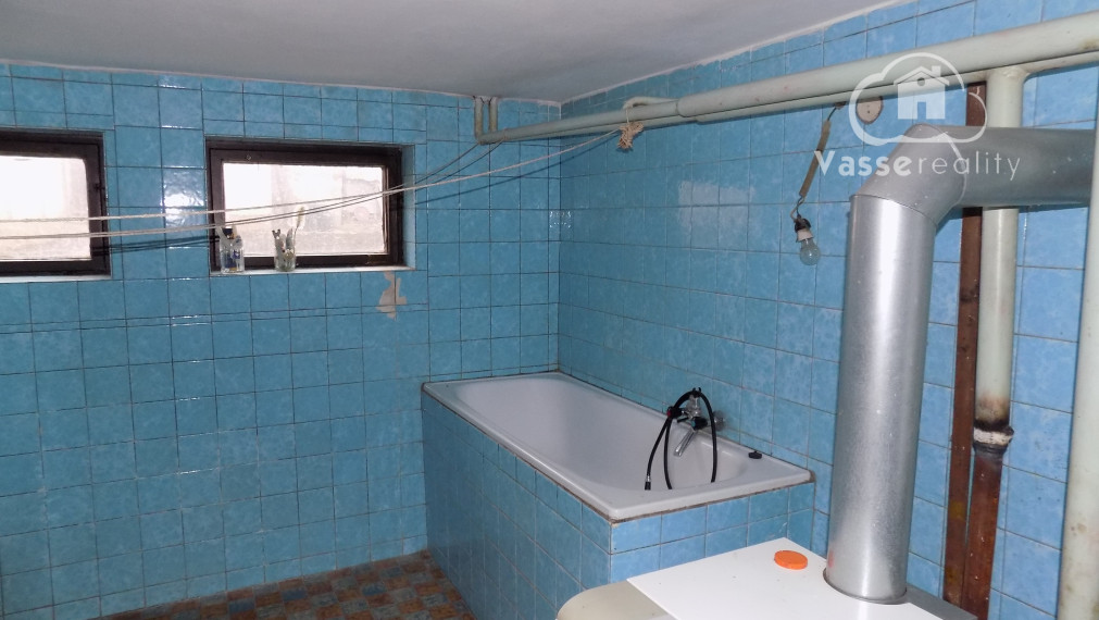 Poschodový dom v Tvrdošovciach  v centre obce  vhodné aj na podnikanie !