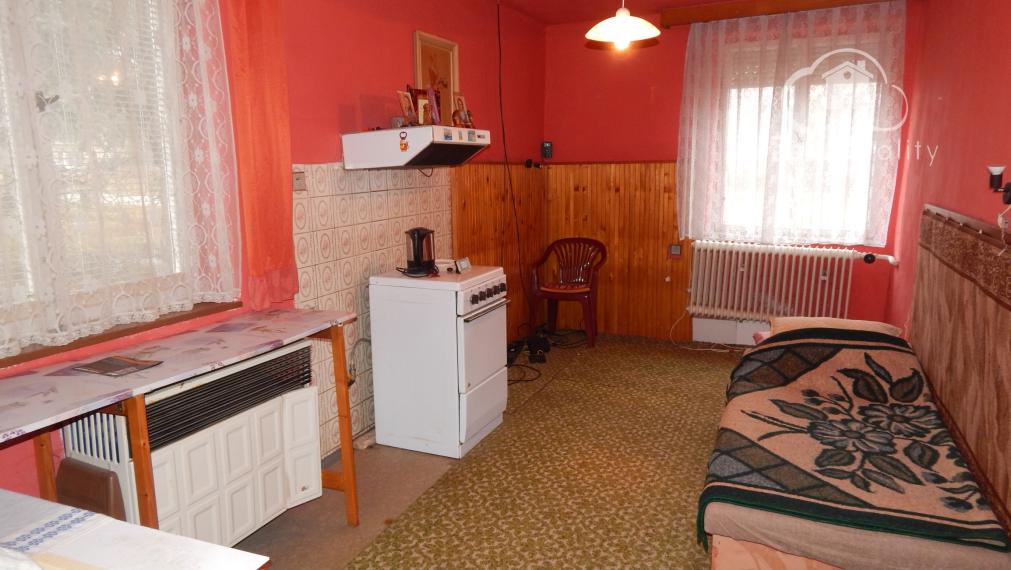 Na predaj 3 izbový dom v Kravanoch nad Dunajom s garážou .