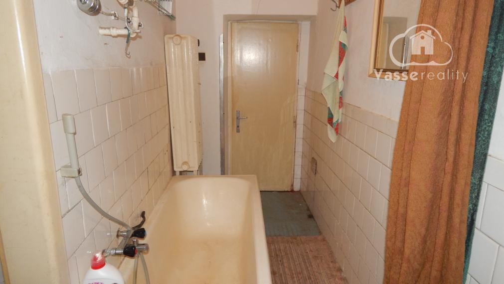 Na predaj 3 izbový dom v Kravanoch nad Dunajom s garážou .