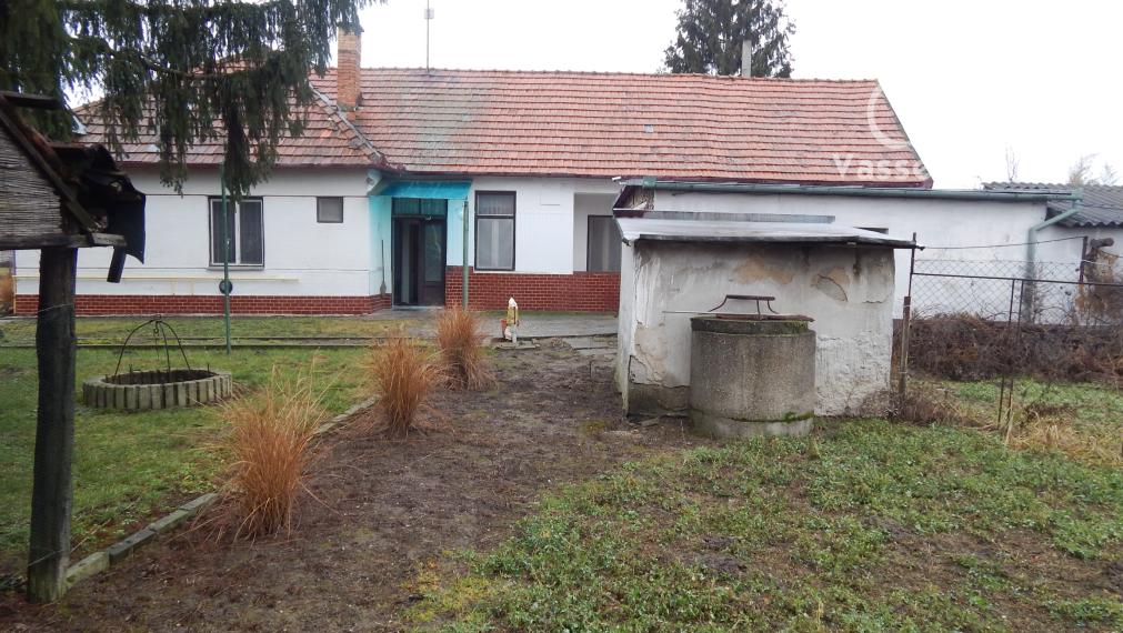 Na predaj 3 izbový dom v Kravanoch nad Dunajom s garážou .